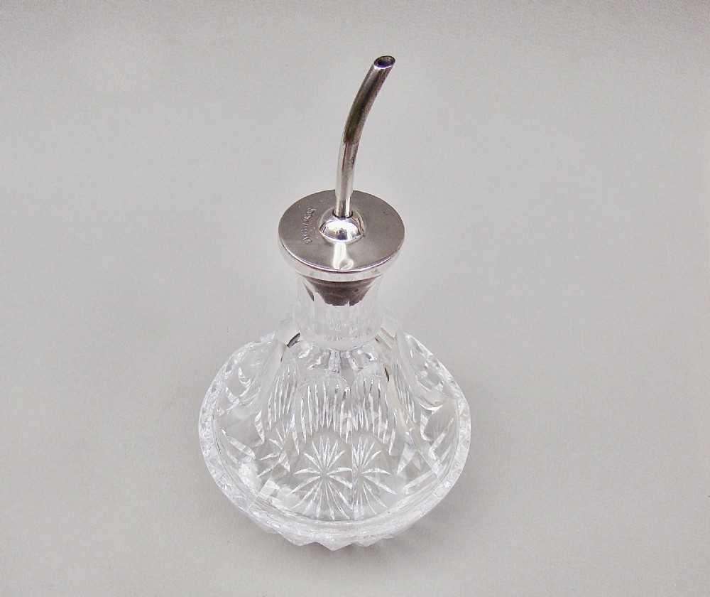 ART DECO  SILVER MOUNTED ANGOSTURA BITTERS BOTTLE BY MAPPIN & WEBB, BIRMINGHAM 1934