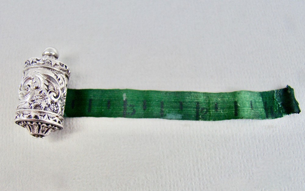 EXQUISITE EARLY VICTORIAN SILVER TAPE MEASURE, CIRCA 1840 View II