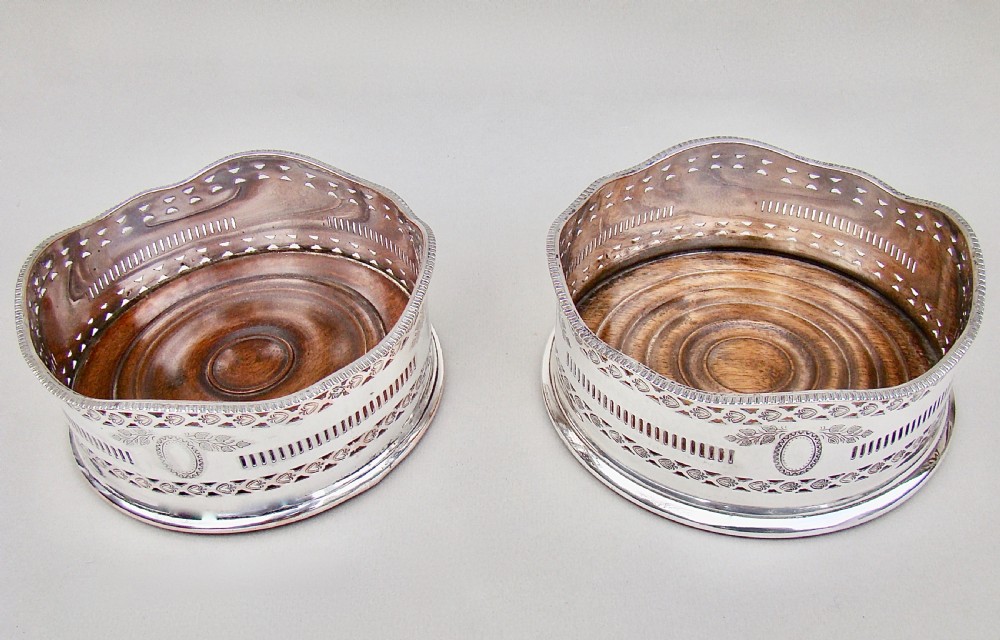 PAIR OF EARLY VICTORIAN SILVER PLATED WINE COASTERS, CIRCA 1840