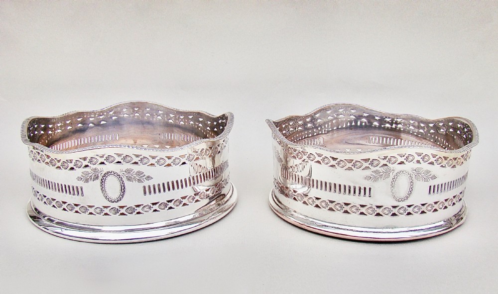 PAIR OF EARLY VICTORIAN SILVER PLATED WINE COASTERS, CIRCA 1840 View II