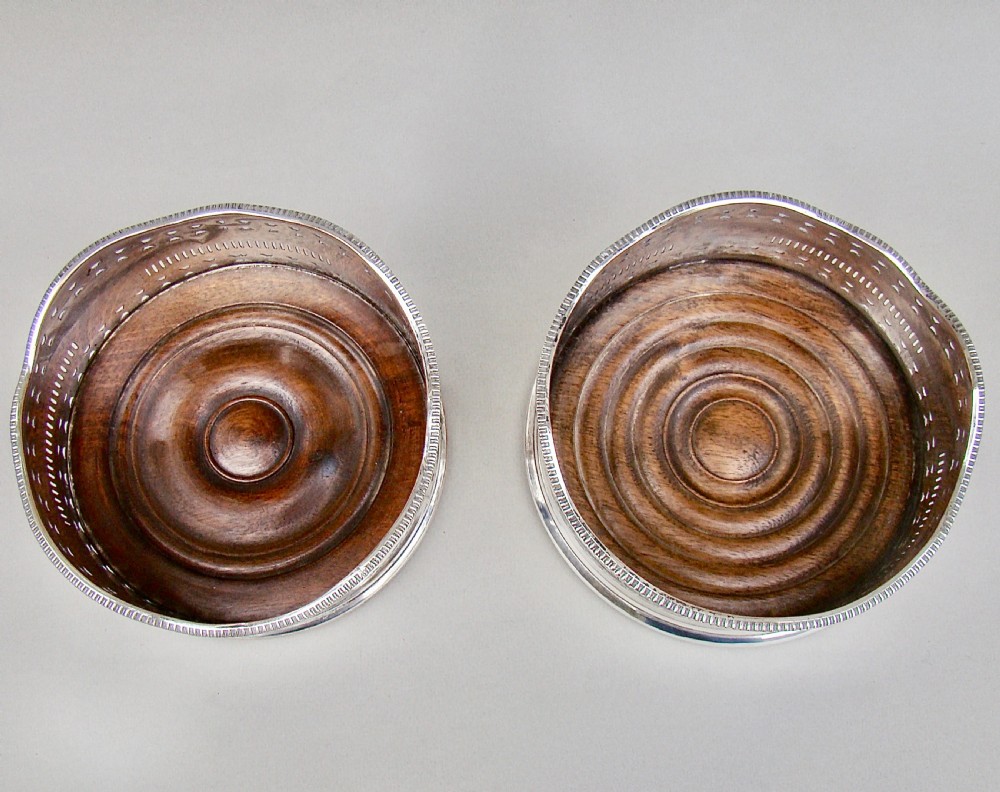 PAIR OF EARLY VICTORIAN SILVER PLATED WINE COASTERS, CIRCA 1840 View IV