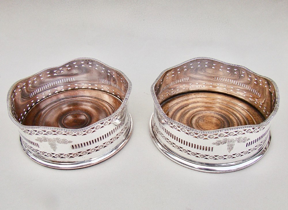 PAIR OF EARLY VICTORIAN SILVER PLATED WINE COASTERS, CIRCA 1840 View V