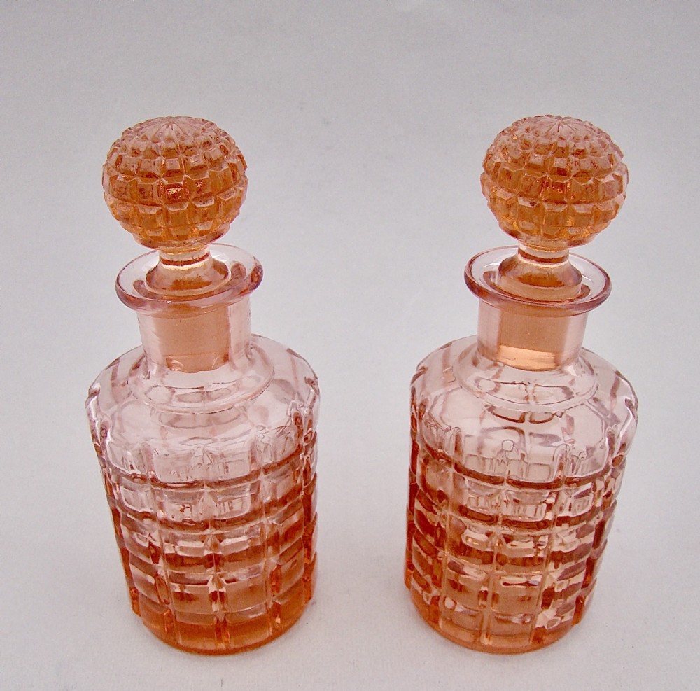 PAIR OF 19TH CENTURY PRESSED GLASS SCENT BOTTLES, CIRCA 1890