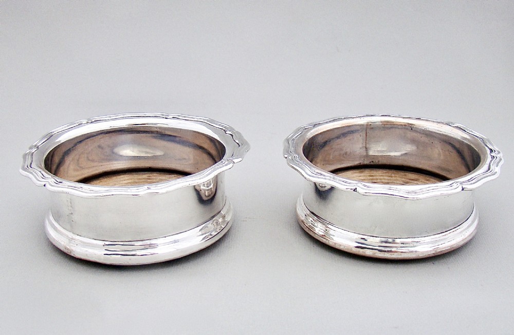 PAIR OF GEORGIAN SILVER PLATED WINE COASTERS OR BOTTLE COASTERS, CIRCA 1800 View III