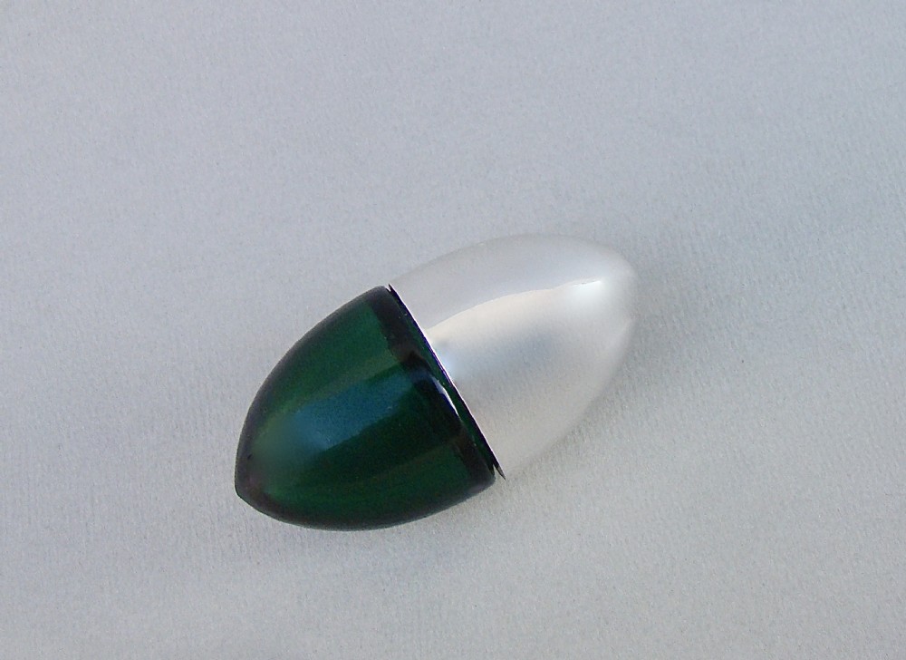 LARGE EMERALD GREEN GLASS BULLET SHAPED SCENT BOTTLE WITH SILVER PLATED LID, CIRCA 1900.