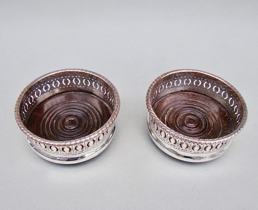 PAIR OF EDWARDIAN SILVER PLATED CONDIMENT COASTERS, CIRCA 1910 View II