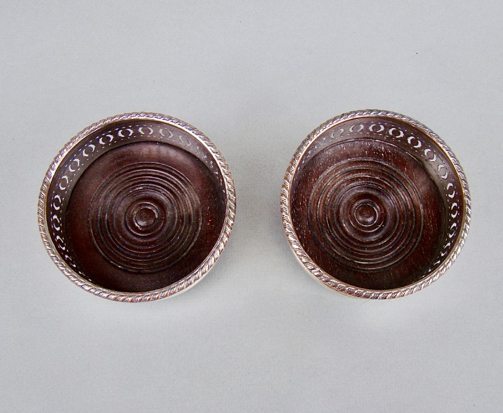 PAIR OF EDWARDIAN SILVER PLATED CONDIMENT COASTERS, CIRCA 1910 View III