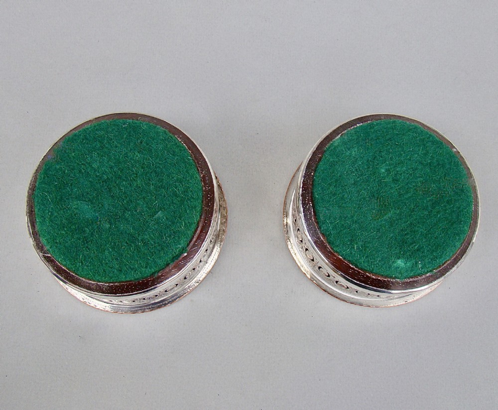 PAIR OF EDWARDIAN SILVER PLATED CONDIMENT COASTERS, CIRCA 1910 View IV
