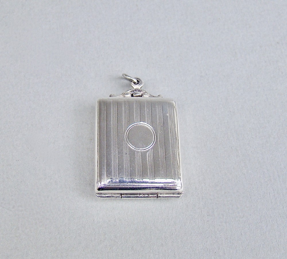 EDWARDIAN SILVER NOVELTY STAMP CASE BY ALBERT ERNEST JENKINS, BIRMINGHAM 1909