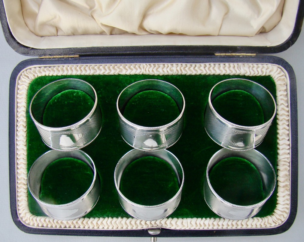 FABULOUS CASED SET OF SIX EDWARDIAN SOLID SILVER NAPKIN RINGS BY WALKER & HALL, SHEFFIELD 1909 View V