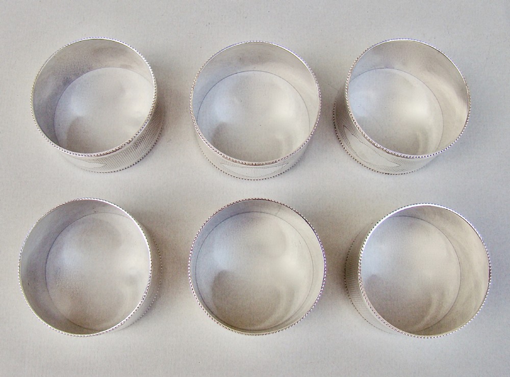FABULOUS CASED SET OF SIX EDWARDIAN SOLID SILVER NAPKIN RINGS BY WALKER & HALL, SHEFFIELD 1909 View VIII