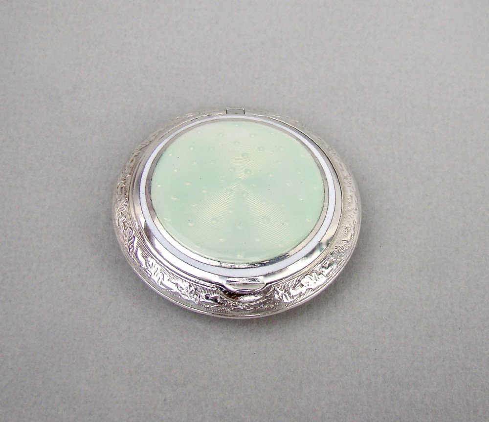 EXQUISITE ART DECO CONTINENTAL SILVER AND GUILLOCHE ENAMEL COMPACT, CIRCA 1930