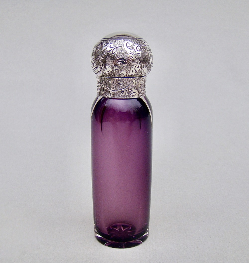 VICTORIAN SILVER AND AMETHYST GLASS SCENT BOTTLE, CIRCA 1890