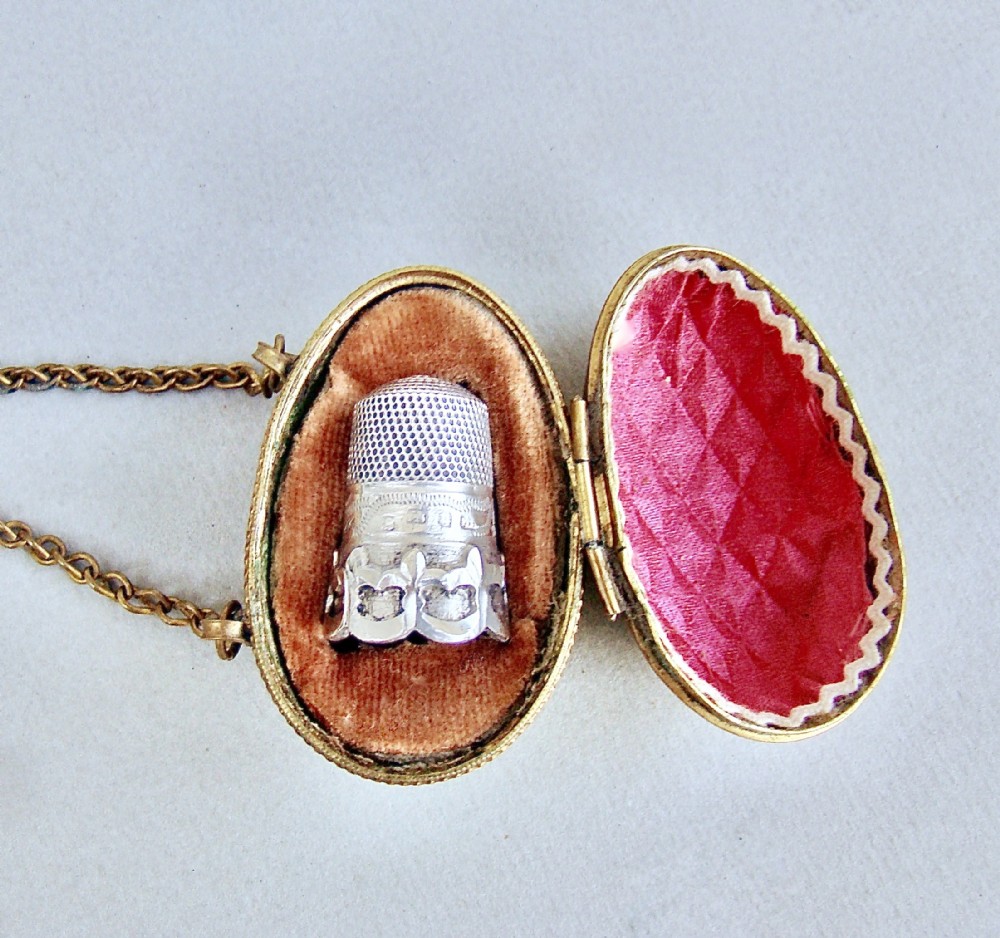 EXQUISITE VICTORIAN SOLID SILVER THIMBLE CASED IN ORMULU CHATELAINE EGG-SHAPED HOLDER