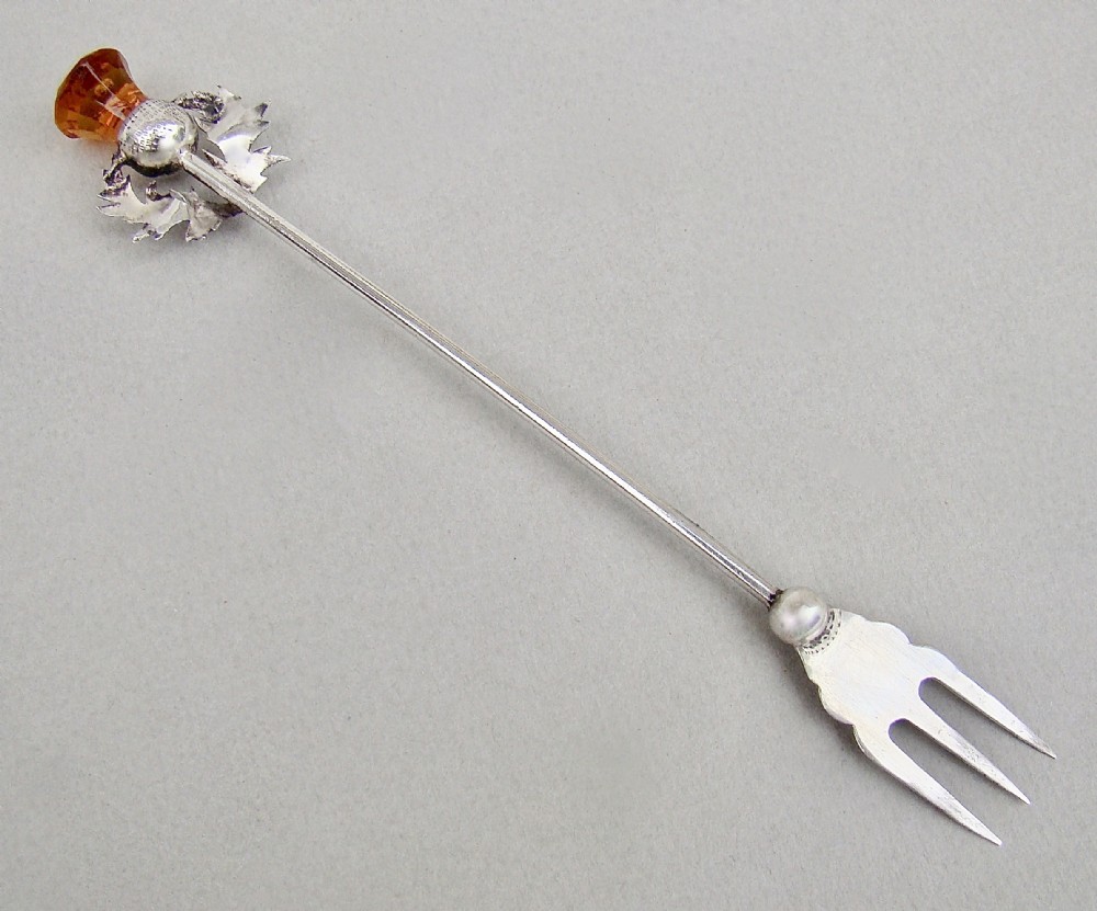 ART DECO SILVER AND AMBER THISTLE COCKTAIL FORK OR PICKLE FORK BY ADIE & LOVEKIN, BIRMINGHAM 1927