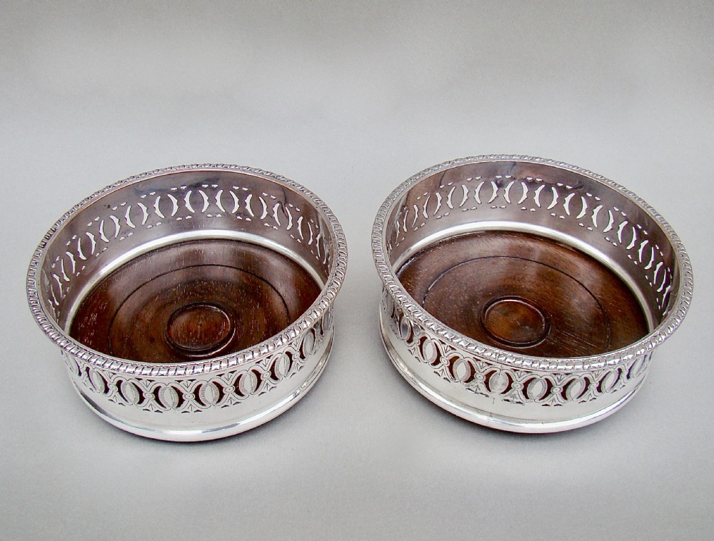 ELEGANT PAIR OF EDWARDIAN SILVER PLATED WINE COASTERS, CIRCA 1900 View II