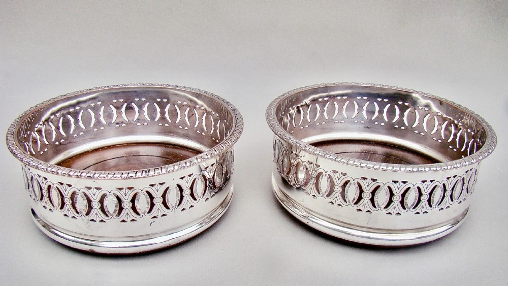 ELEGANT PAIR OF EDWARDIAN SILVER PLATED WINE COASTERS, CIRCA 1900 View V