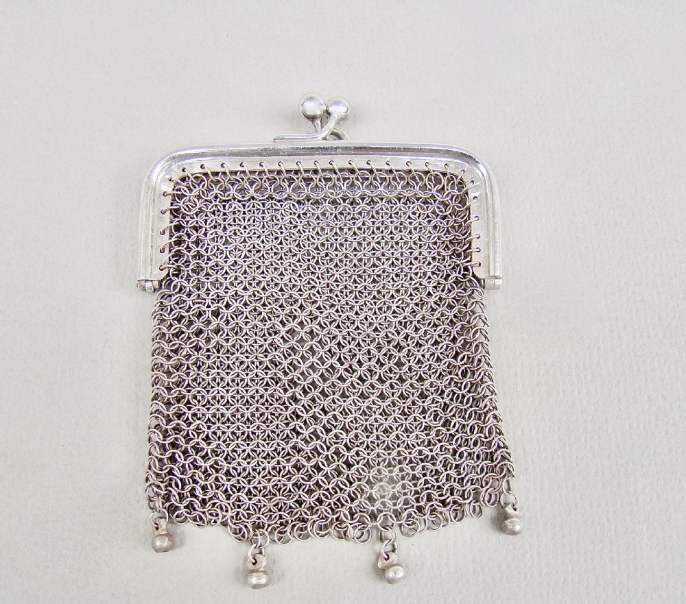 CONTINENTAL SILVER MESH CHATELAINE COIN PURSE, CIRCA 1900