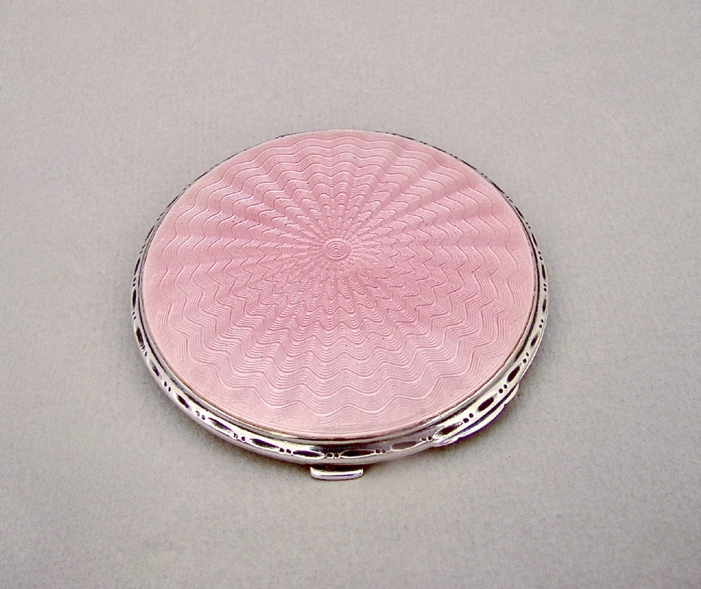 ART DECO SILVER AND PINK GUILLOCHE ENAMEL COMPACT BY CRISFORD & NORRIS, BIRMINGHAM 1935