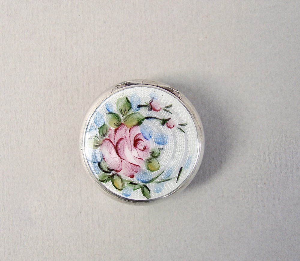 DELIGHTFUL MID-CENTURY STERLING SILVER AND BOTANICAL GUILLOCHE ENAMEL PILL BOX, CIRCA 1910