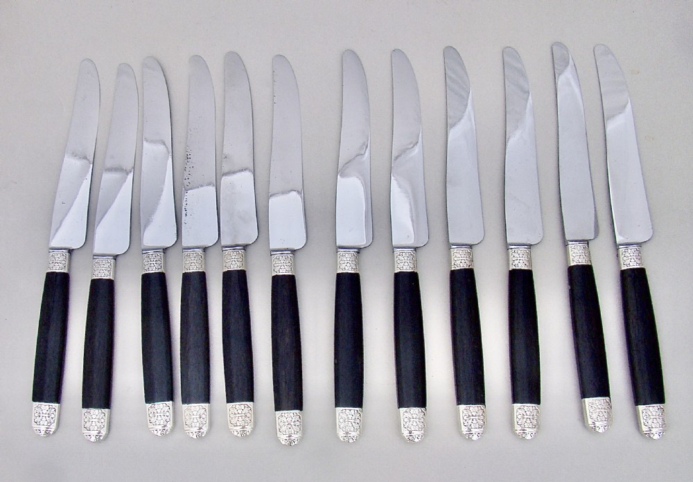 FABULOUS CASED SET OF TWELVE SILVER PLATED FRENCH TABLE KNIVES WITH EBONY HANDLES AND STEEL BLADES, PARIS CIRCA 1890 View V