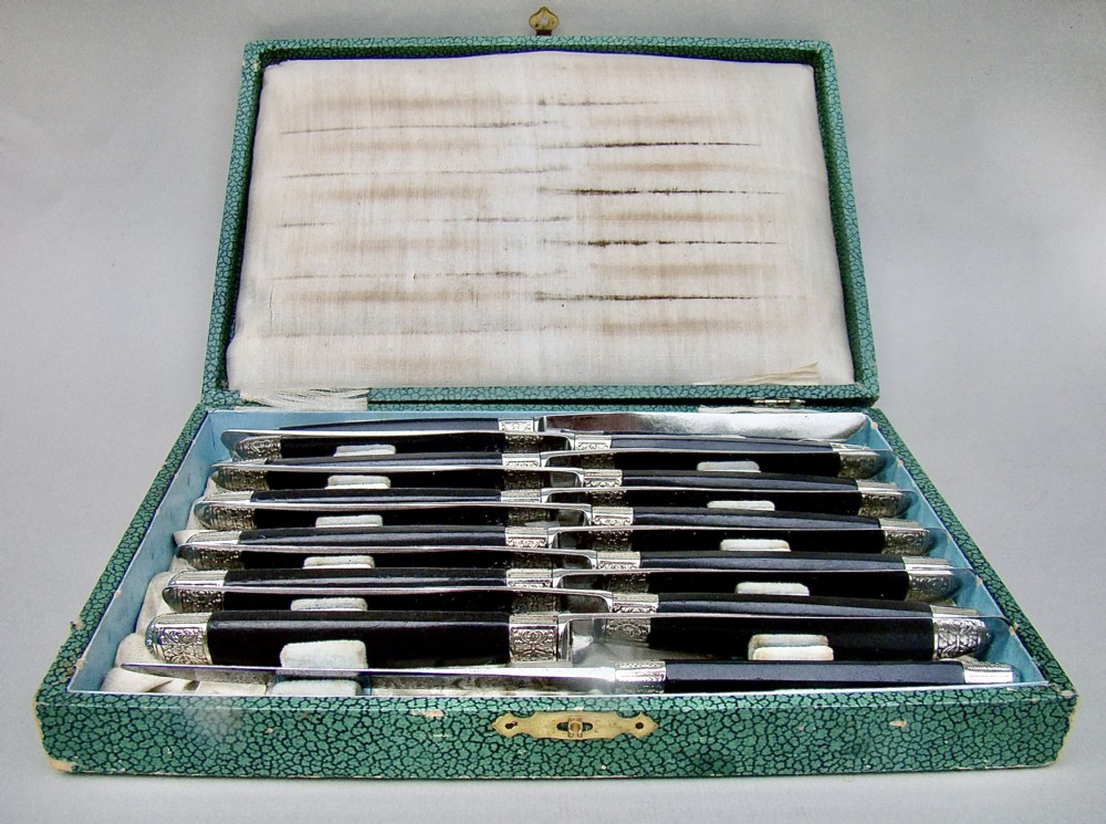 FABULOUS CASED SET OF TWELVE SILVER PLATED FRENCH SMALL KNIVES WITH EBONY HANDLES AND STEEL BLADES, PARIS CIRCA 1890 View II