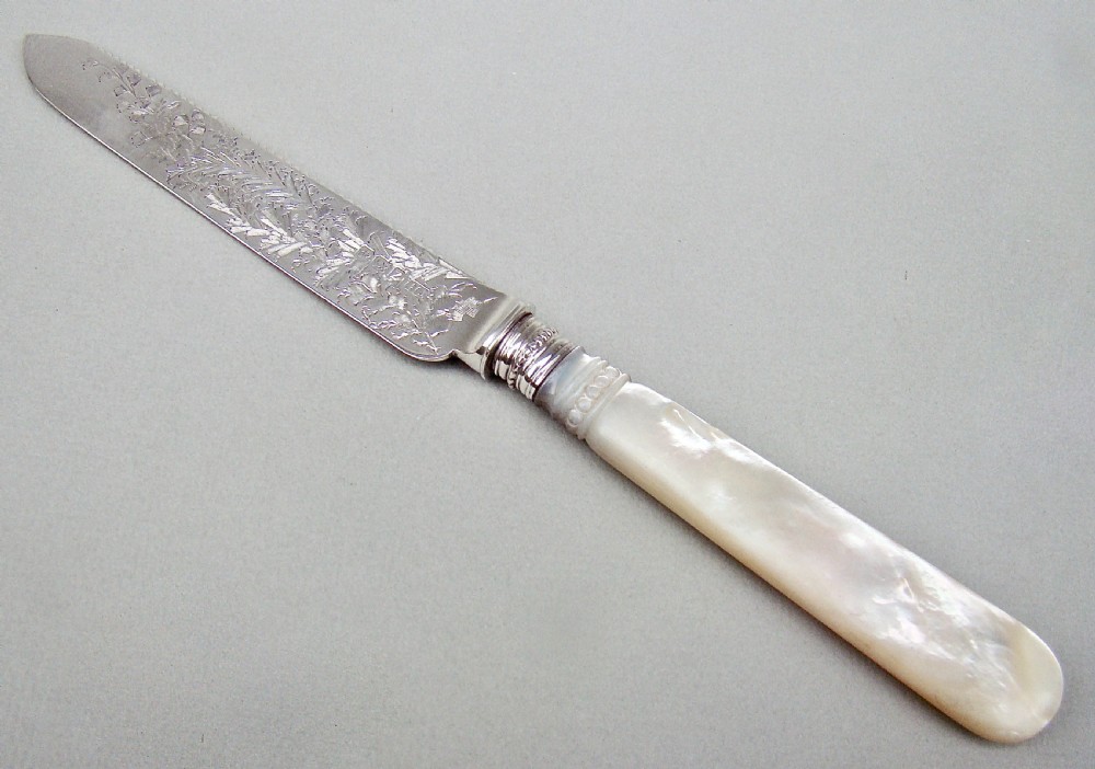 CASED VICTORIAN SOLID SILVER AND MOTHER OF PEARL CAKE KNIFE BY THE ATKINS BROTHERS, SHEFFIELD 1892 View III