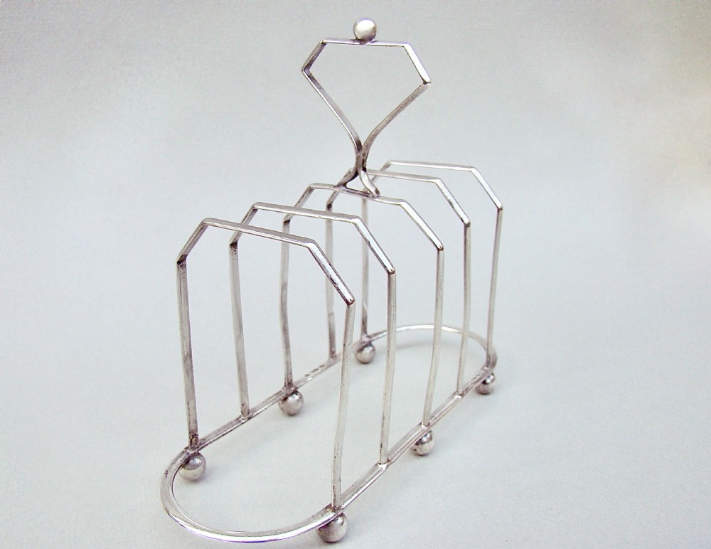 UNUSUAL VICTORIAN SILVER FIVE DIVISION TOAST RACK BY THE WILLIAM DEVENPORT, BIRMINGHAM 1900 View II