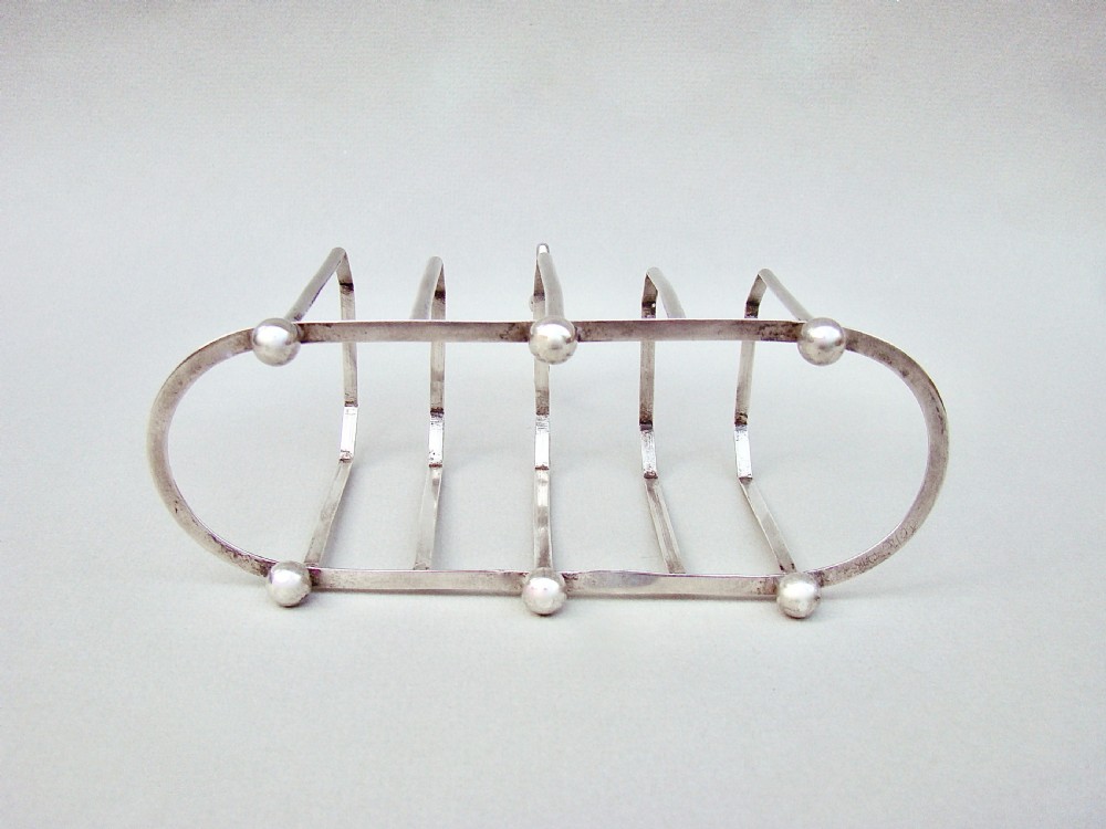 UNUSUAL VICTORIAN SILVER FIVE DIVISION TOAST RACK BY THE WILLIAM DEVENPORT, BIRMINGHAM 1900 View VI