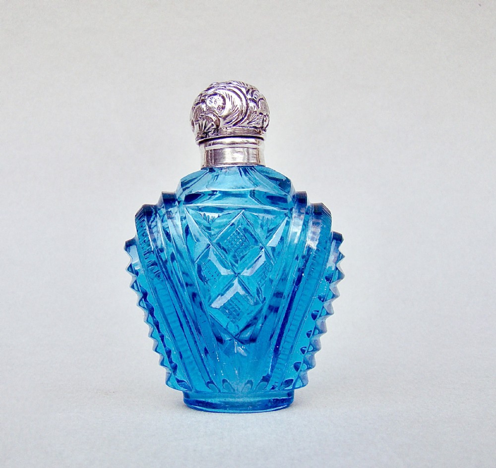 UNUSUAL VICTORIAN SILVER & SLICED-CUT TURQUOISE GLASS SCENT BOTTLE, CIRCA 1880
