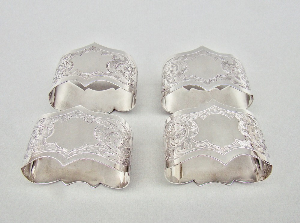 CASED SET OF FOUR EDWARDIAN SOLID SILVER NAPKIN RINGS BY ROBERT CHANDLER, BIRMINGHAM 1904
 View IV