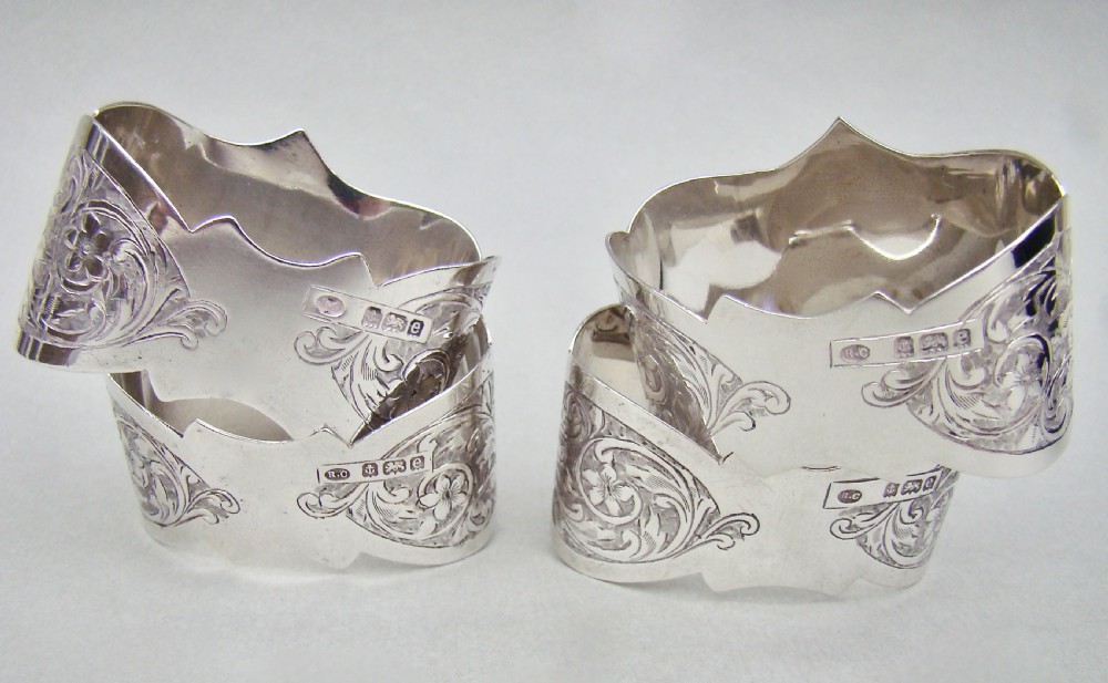 CASED SET OF FOUR EDWARDIAN SOLID SILVER NAPKIN RINGS BY ROBERT CHANDLER, BIRMINGHAM 1904
 View V