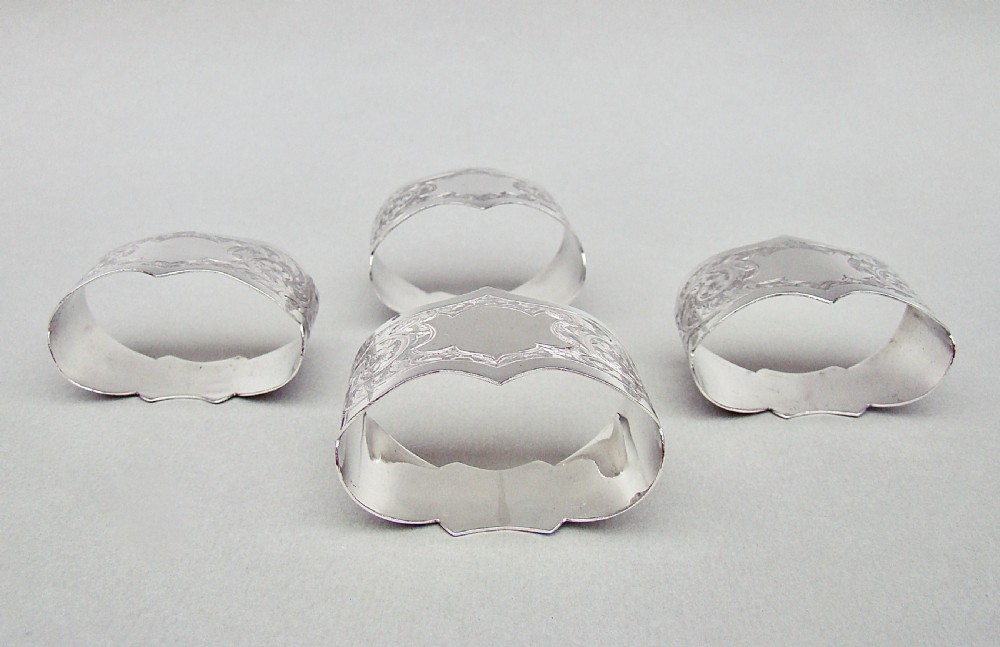 CASED SET OF FOUR EDWARDIAN SOLID SILVER NAPKIN RINGS BY ROBERT CHANDLER, BIRMINGHAM 1904
 View VI