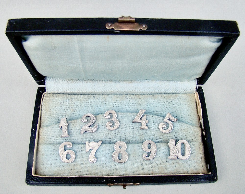 RARE CASED SET OF DUTCH SILVER NOVELTY DRINKING GLASS MARKERS, NETHERLANDS CIRCA 1910 View II