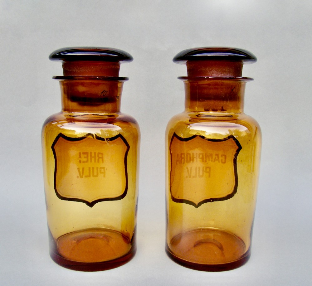 RARE PAIR OF 19TH CENTURY FRENCH AMBER GLASS APOTHECARY JARS, CIRCA 1890 View II