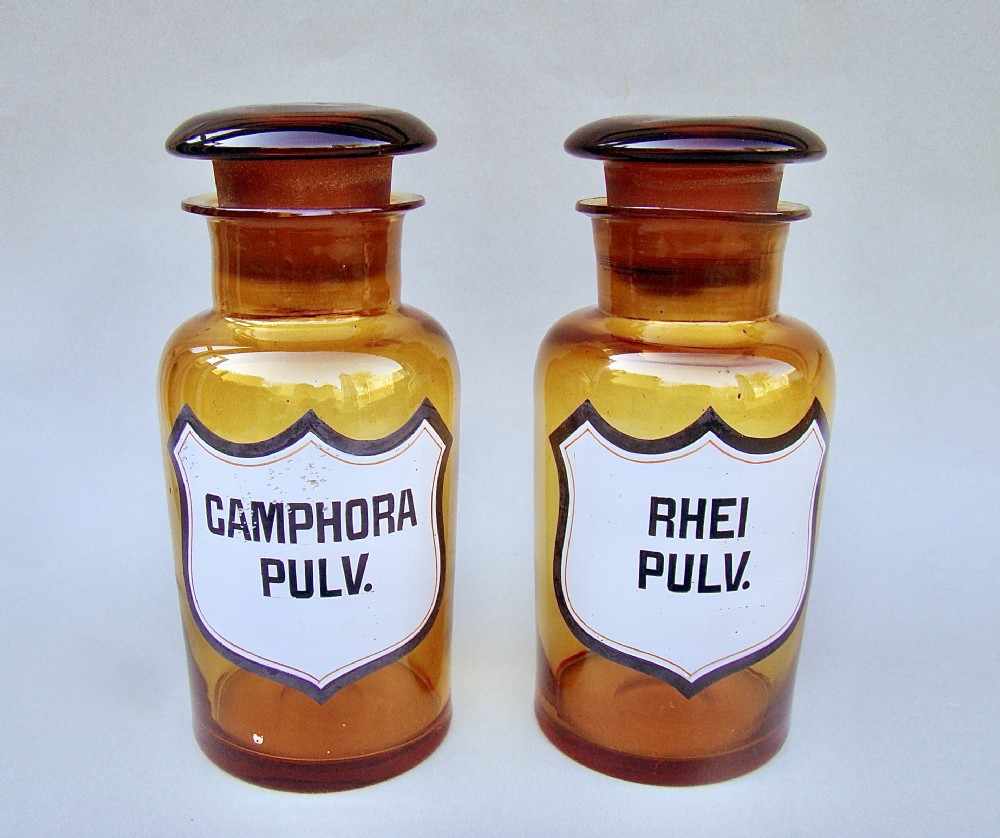 RARE PAIR OF 19TH CENTURY FRENCH AMBER GLASS APOTHECARY JARS, CIRCA 1890
