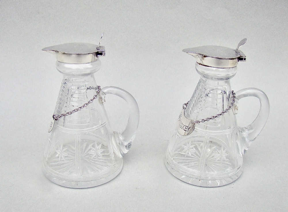 PAIR OF ART DECO SILVER MOUNTED WHISKY TOTS BY THE GOLDSMITHS & SILVERSMITH CO LTD, LONDON 1933 View III