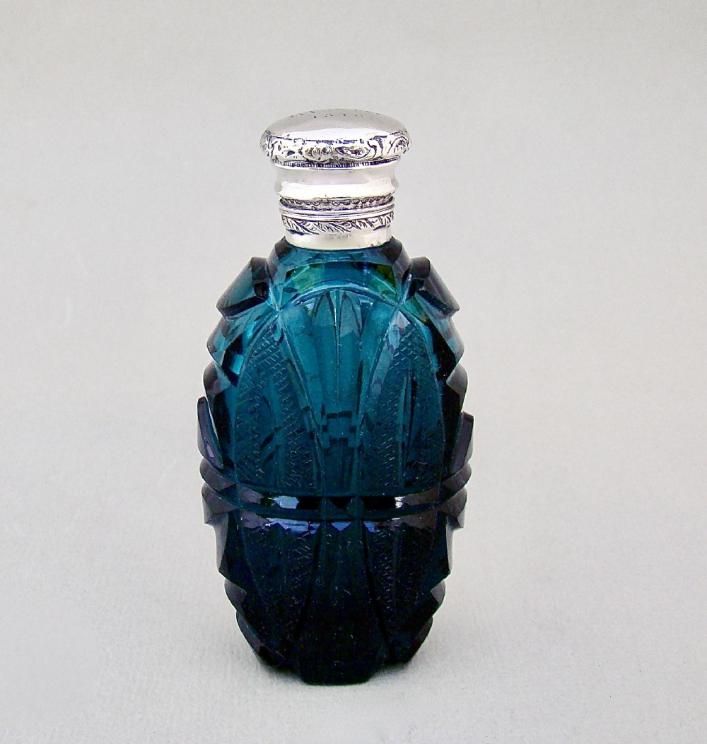 FABULOUS EARLY VICTORIAN SILVER MOUNTED SLICED-CUT TEAL GLASS SCENT BOTTLE, DATED 1848