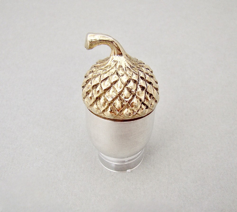 RARE TIFFANY STERLING SILVER & SILVER GILT ACORN THIMBLE HOLDER, CIRCA 1910
