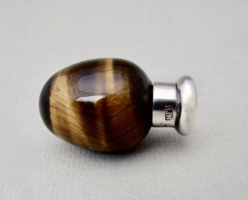 RARE SAMPSON MORDAN SILVER MOUNTED TIGER'S EYE EGG SCENT BOTTLE, LONDON 1886