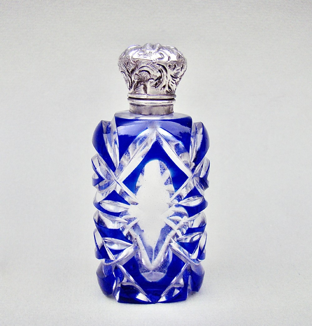 VICTORIAN SILVER AND BRISTOL BLUE OVERLAY BOHEMIAN GLASS SCENT BOTTLE , CIRCA 1890