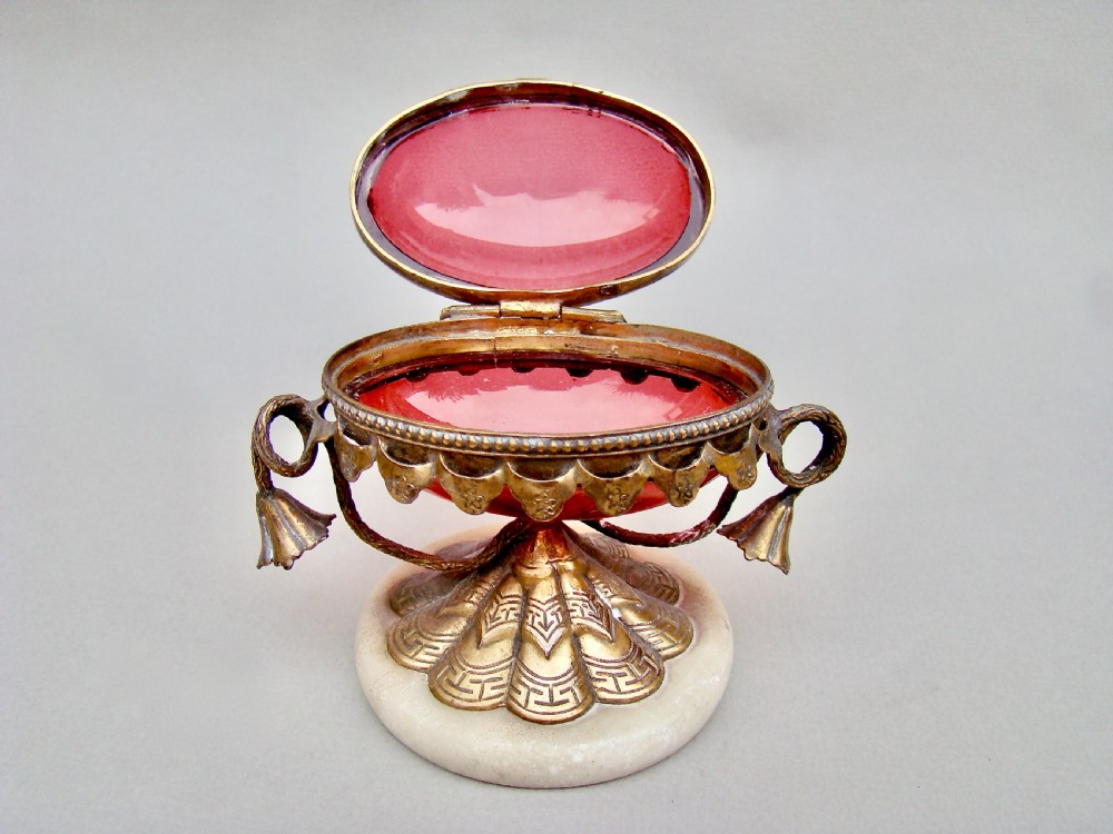 FRENCH PALAIS ROYAL EGG-SHAPED RUBY GLASS CASKET WITH GILT ORMULU MOUNTS, CIRCA 1860 View III