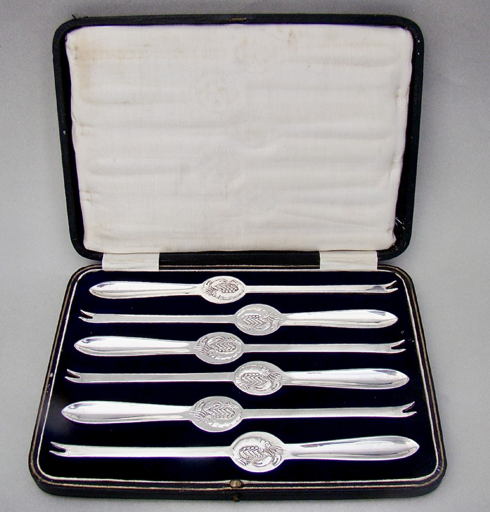 RARE ART DECO SILVER CASED SET OF SIX EDWARDIAN SILVER LOBSTER PICKS BY WILLIAM HUTTON, SHEFFIELD 1928