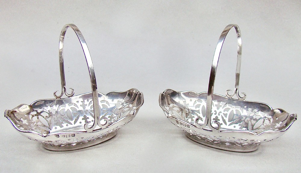 EXQUISITE PAIR OF GEORGE V SILVER BONBON BASKETS BY ALEXANDER CLARK, BIRMINGHAM 1911
