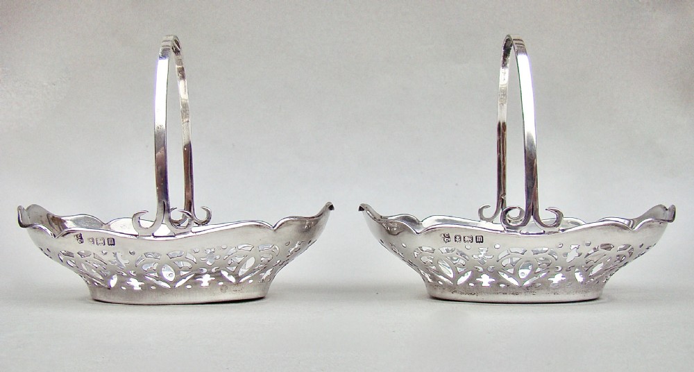 EXQUISITE PAIR OF GEORGE V SILVER BONBON BASKETS BY ALEXANDER CLARK, BIRMINGHAM 1911
 View II