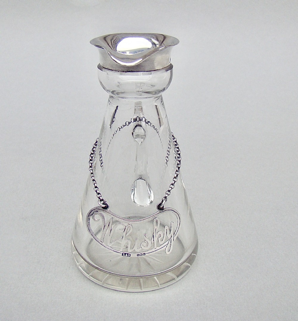 UNUSUAL EDWARDIAN SILVER WHISKY TOT & MATCHING LABEL BY LEVI & SALAMAN, BIRMINGHAM 1909