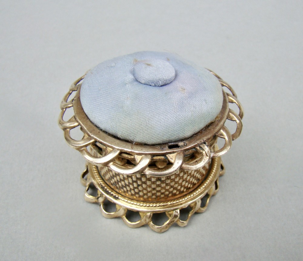 UNUSUAL MID-VICTORIAN ORMULU NOVELTY TAPE MEASURE & PIN CUSHION,  CIRCA 1860 View III
