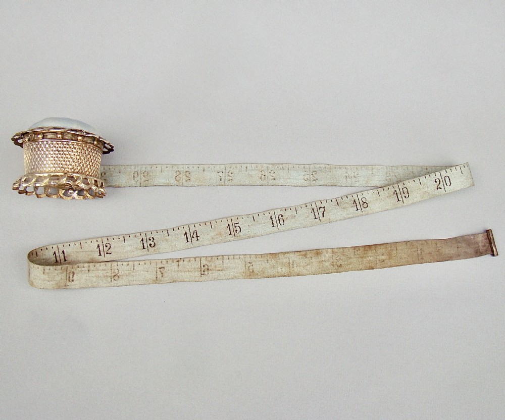 UNUSUAL MID-VICTORIAN ORMULU NOVELTY TAPE MEASURE & PIN CUSHION,  CIRCA 1860 View V