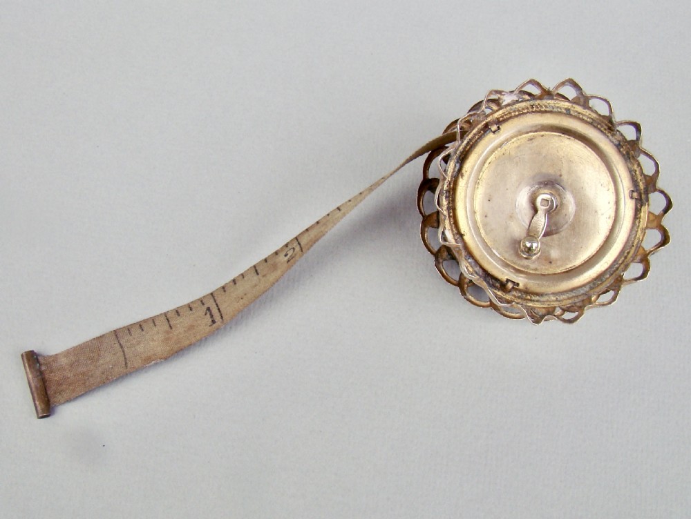UNUSUAL MID-VICTORIAN ORMULU NOVELTY TAPE MEASURE & PIN CUSHION,  CIRCA 1860 View VI
