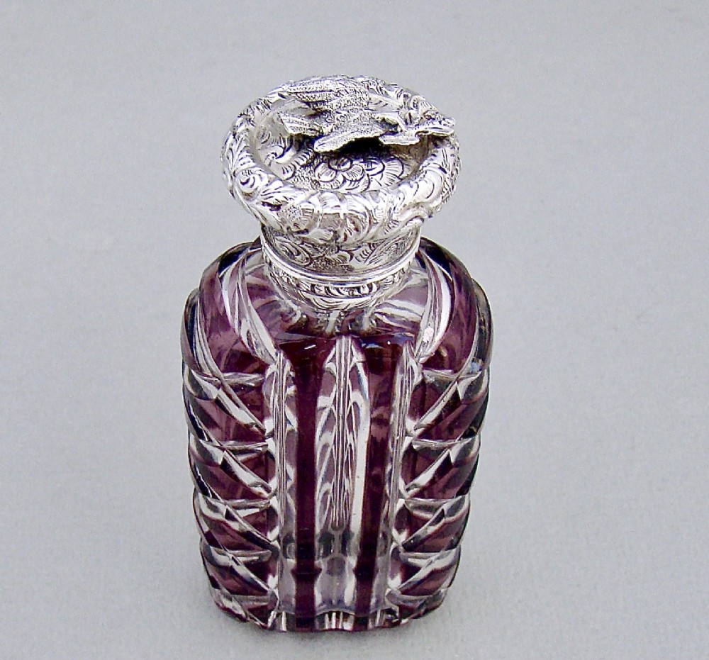 RARE VICTORIAN SILVER AND AMETHYST OVERLAY BOHEMIAN GLASS SCENT BOTTLE, CIRCA 1890